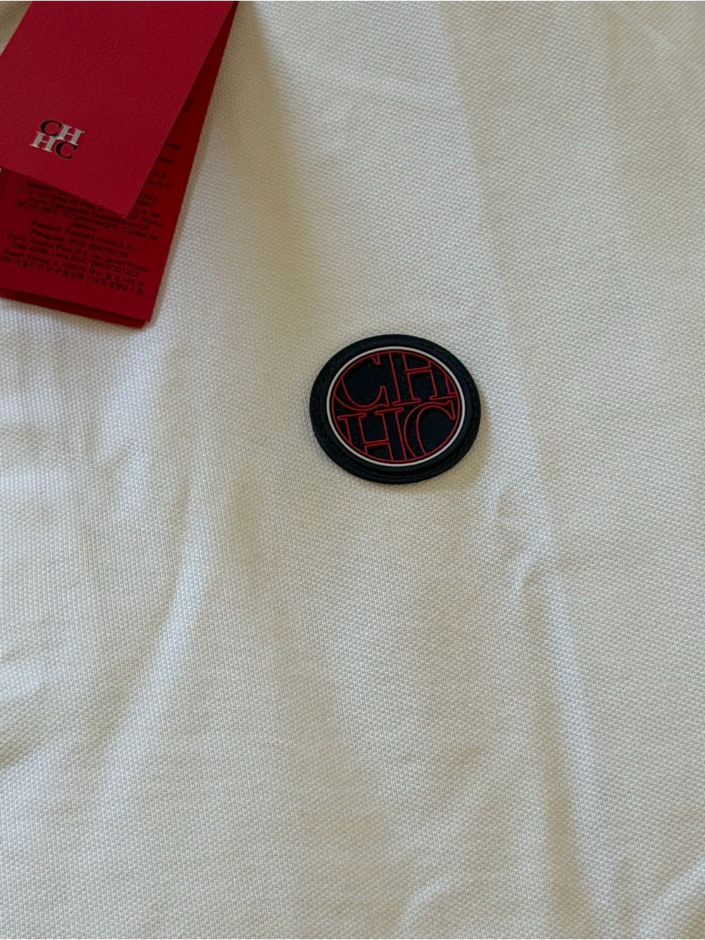 Carolina Herrera White Polo with Black & Red Round Logo Patch